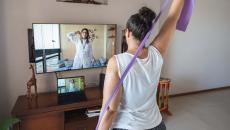 A woman doing at-home physical therapy exercises